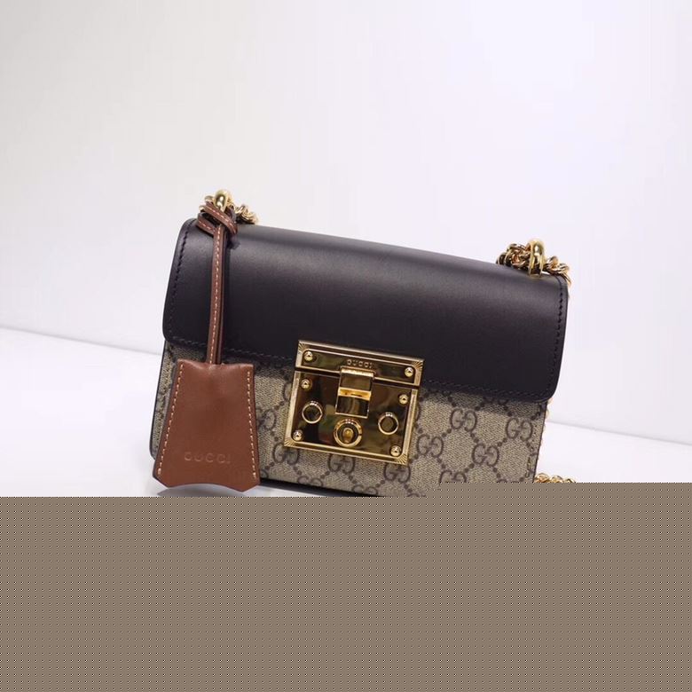 G*u*i top handle bags